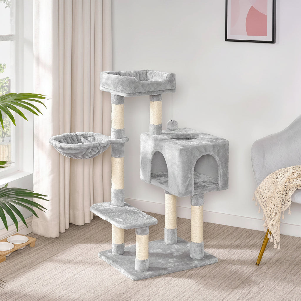 Cat tree with multiple levels and platforms in a home setting.
